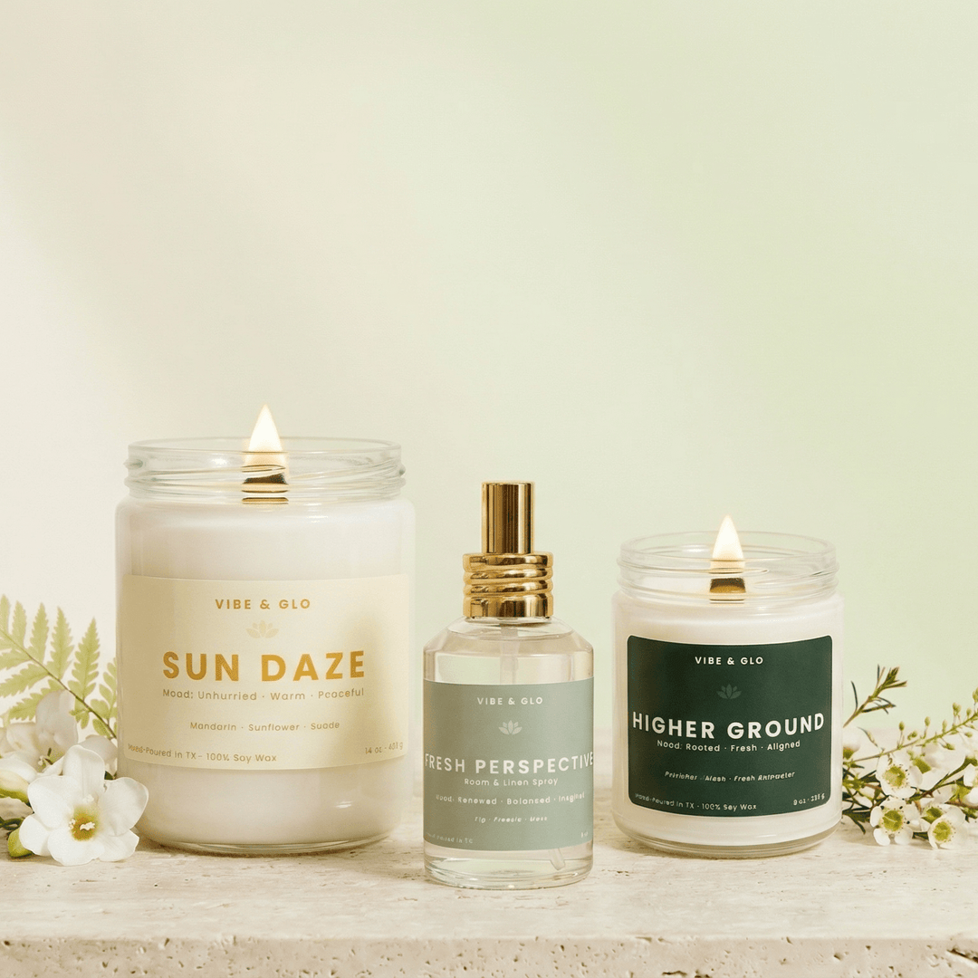 Vibe & Glo spring wooden wick soy candles and room spray styled with fresh florals, featuring clean-burning home fragrance for spring.
