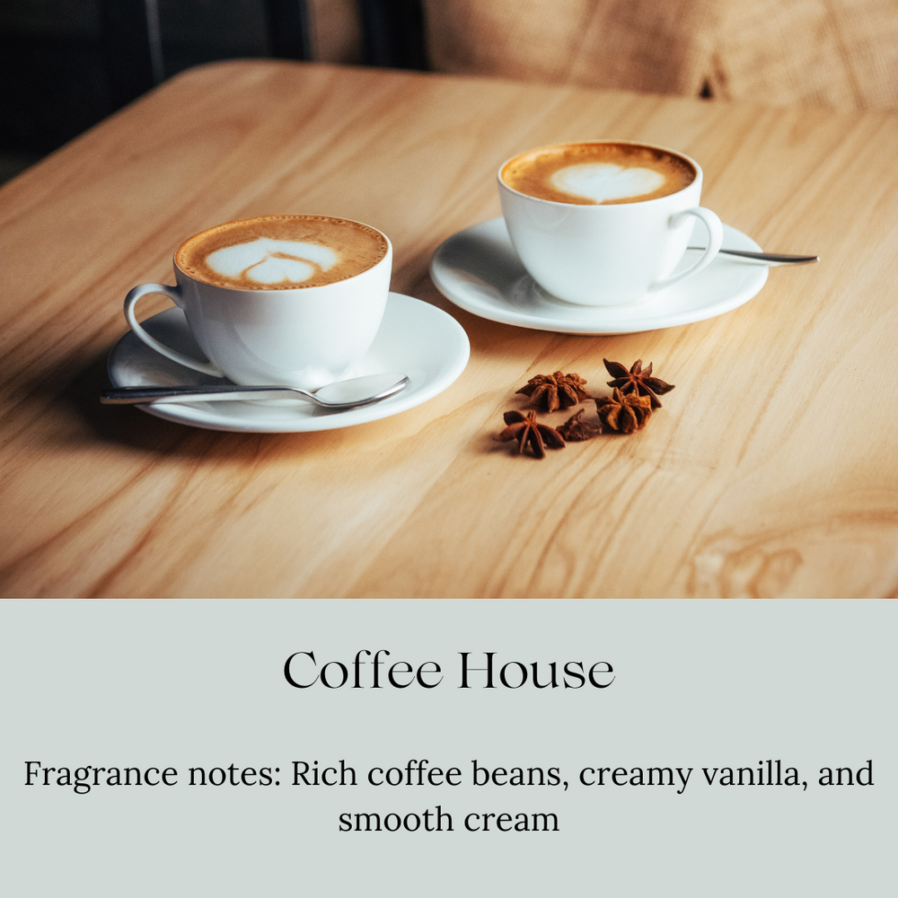 
                      
                        Two white cups of frothy cappuccino with latte art on a wooden table, accompanied by star anise and a spoon. Below the image, the text reads 'Coffee House' with fragrance notes of rich coffee beans, creamy vanilla, and smooth cream.
                      
                    