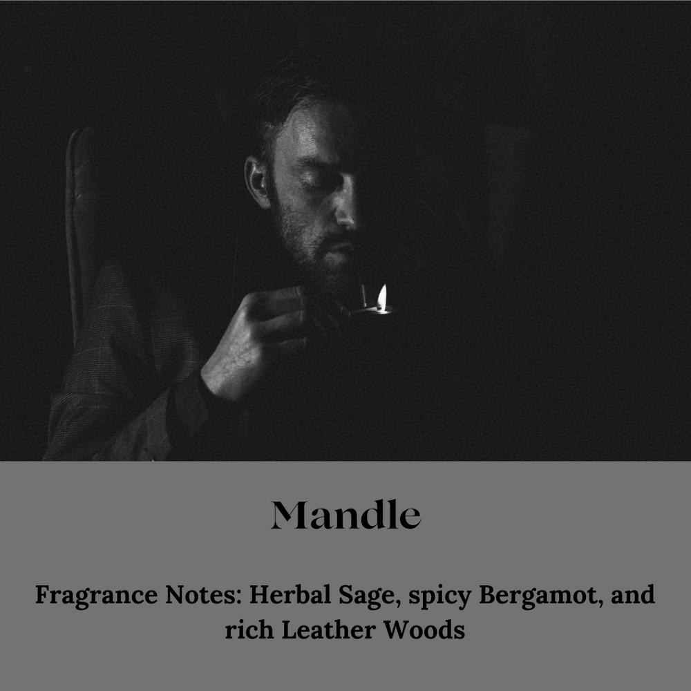 
                      
                        A black-and-white image of a man in low light, holding a small flame close to his face, creating a moody and masculine atmosphere. The text below reads 'Mandle' with fragrance notes of herbal sage, spicy bergamot, and rich leather woods.
                      
                    