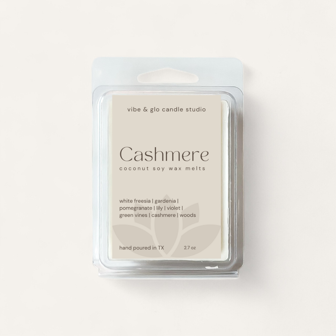 Cashmere coconut soy wax melts package featuring aromas like white freesia, gardenia, and pomegranate.