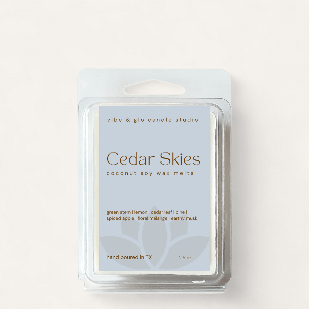 Cedar Skies coconut soy wax melts packaging featuring green stem, apple, and earthy musk scents.