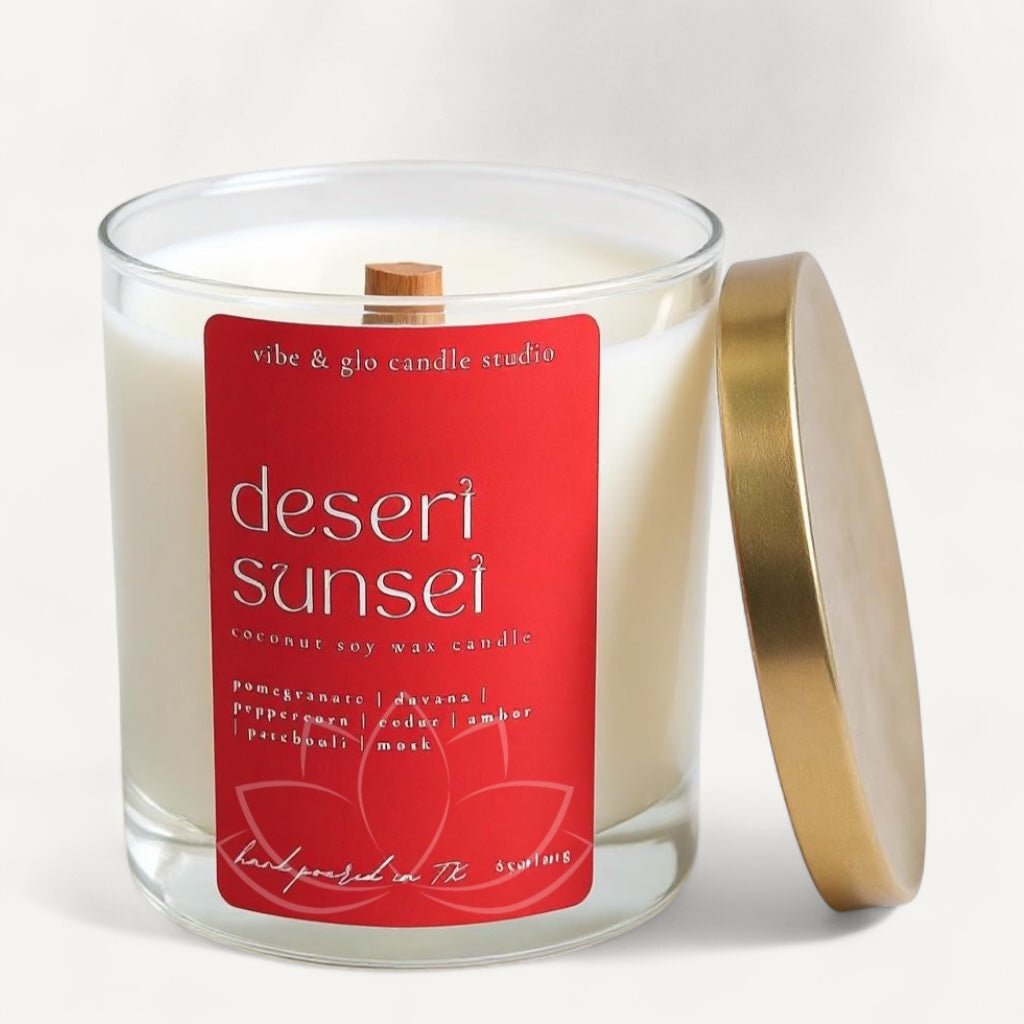 Desert Sunset candle by Vibe and Glo with warm amber scent and bold red label.