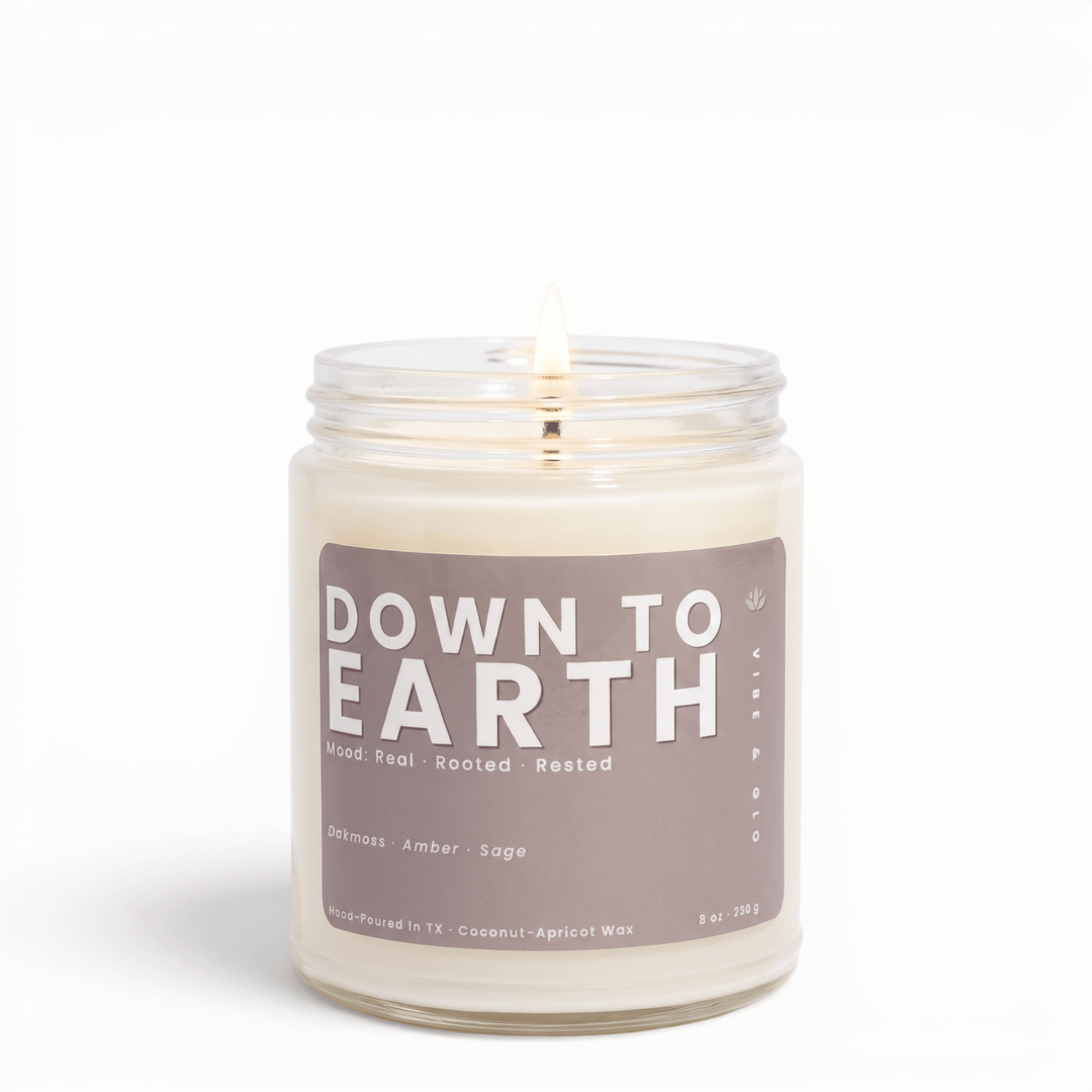 Down to Earth amber sage oakmoss candle in glass jar, grounding woody scented coconut apricot wax candle for a cozy home atmosphere