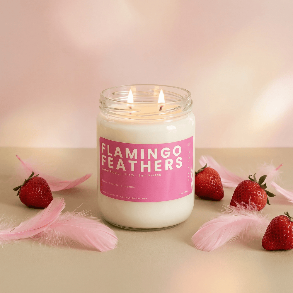 Flamingo Feathers 2 wick candle with strawberries and pink feathers styled in soft playful summer aesthetic