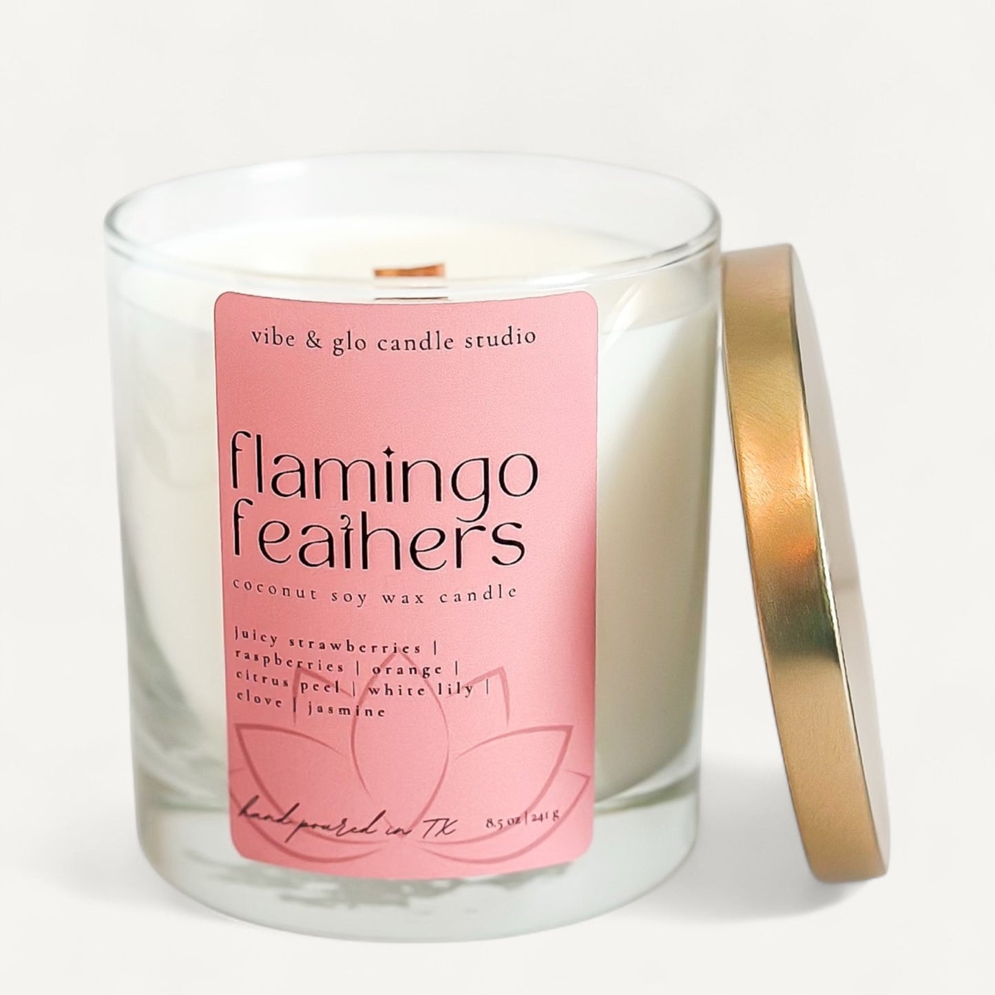 Flamingo Feathers candle with tropical fruity fragrance and blush pink label by Vibe and Glo.