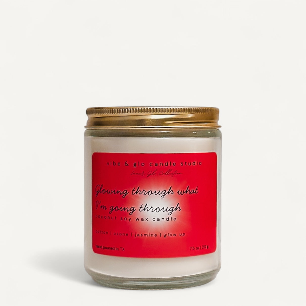 Glowing through what I’m going through coconut soy wax candle by Vibe & Glo Candle Studio with cotton, ozone, and jasmine. Clean, airy, floral fragrance, hand-poured in Texas.
