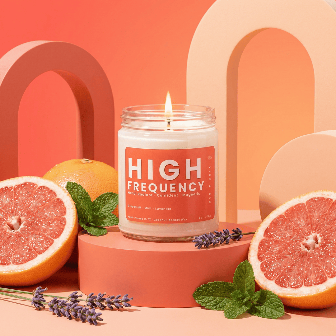 High Frequency candle with grapefruit mint and lavender in a modern citrus inspired home decor scene