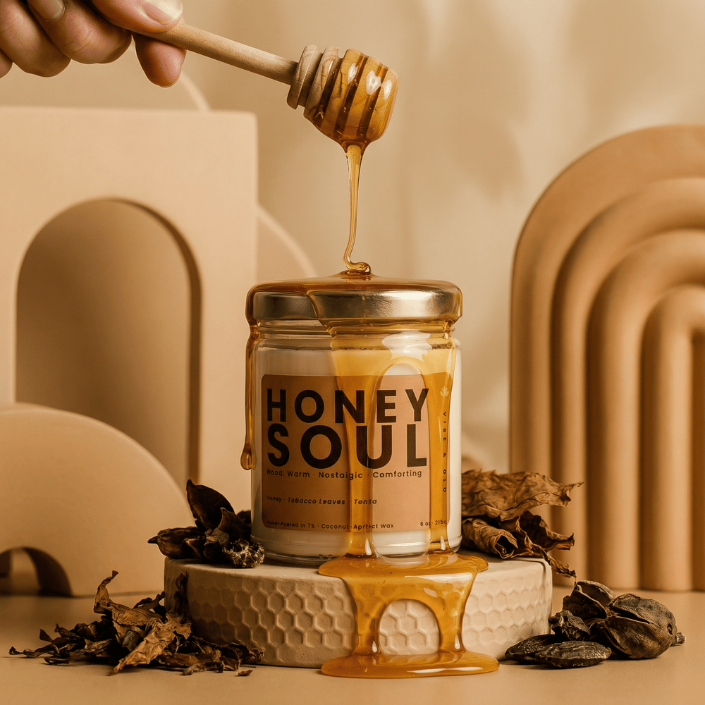 Honey dripping over Honey Soul candle creating a rich warm luxury scent visual with notes of honey tobacco leaves and tonka