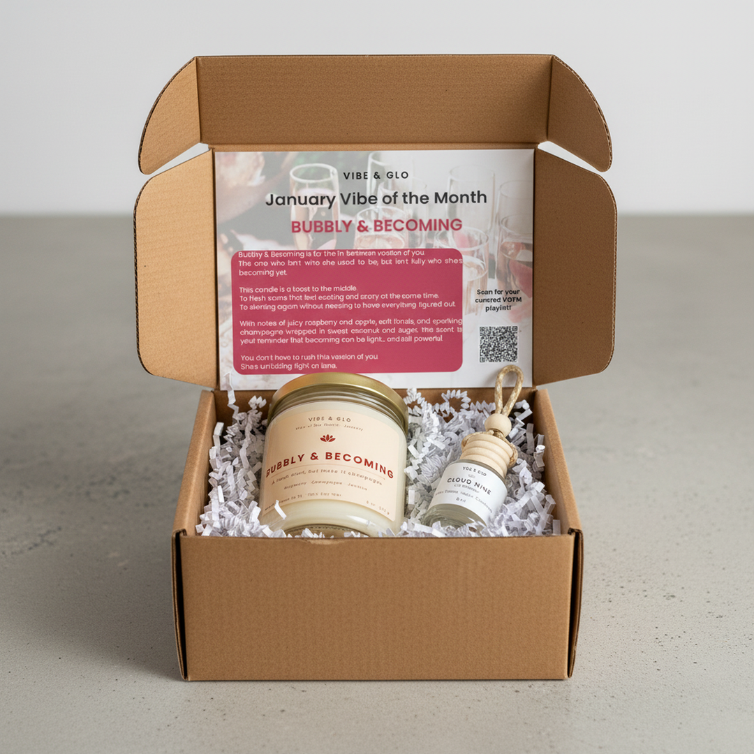 Open January Vibe of the Month candle subscription box featuring the Bubbly & Becoming soy candle, Cloud Nine car diffuser, and printed mood card inside a kraft box.