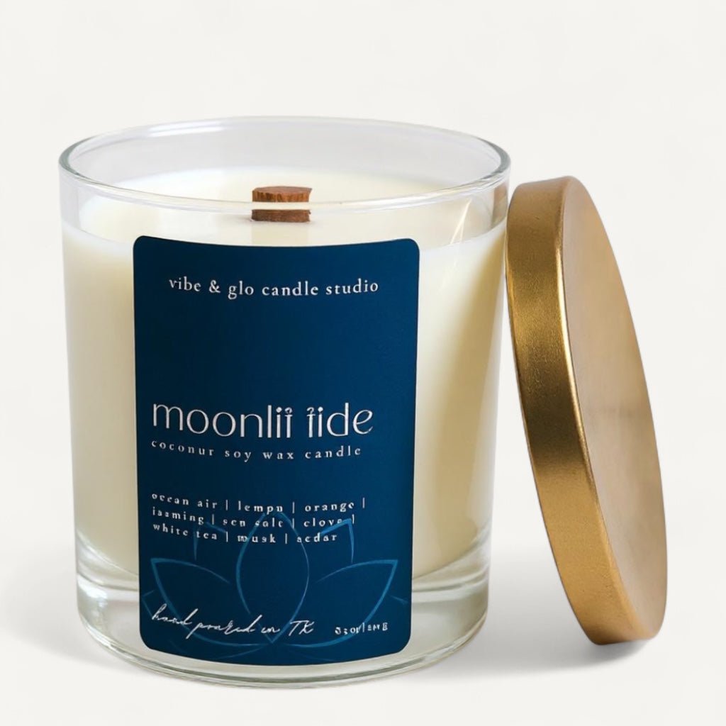 Moonlit Tide coconut soy candle with ocean-inspired fragrance and dark navy label.
