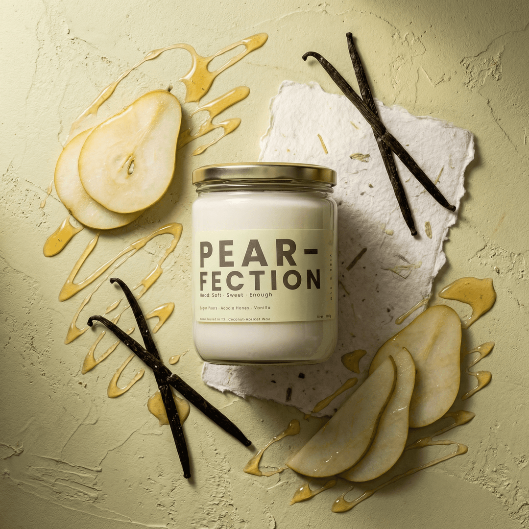 Pear-Fection candle flat lay with pear slices, vanilla beans, and honey drizzle, sweet fruity candle with warm vanilla notes