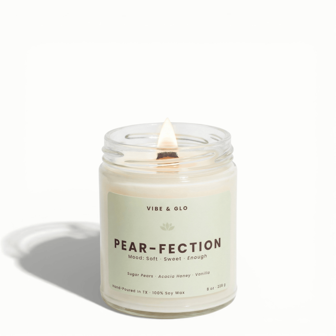 Pear-Fection wooden wick soy candle by Vibe & Glo with sugar pear, acacia honey, and vanilla in clear 8 oz glass jar.