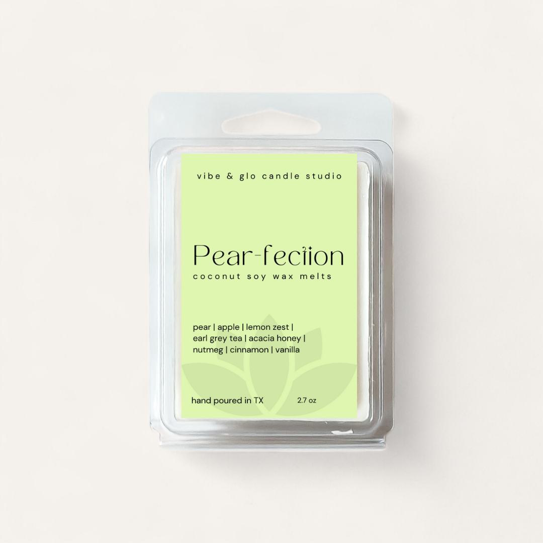 Pear-fection wax melts in packaging, showcasing scents of pear, apple, earl grey, and honey, 2.7 oz.