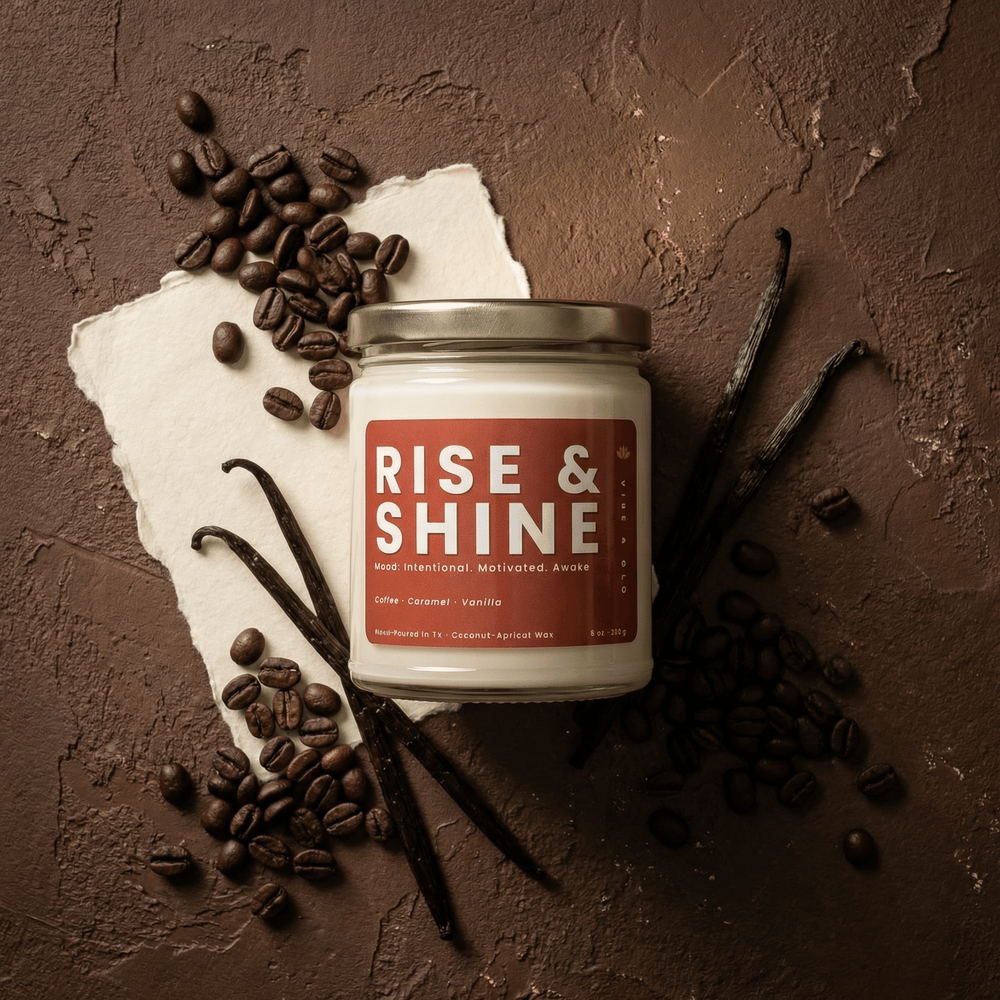 Rise and Shine coffee scented candle styled with coffee beans and vanilla pods, warm caramel vanilla fragrance in coconut apricot wax