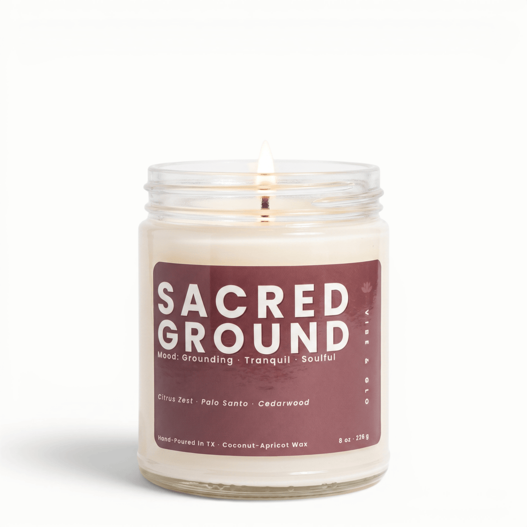 Sacred Ground palo santo cedarwood candle with citrus zest in glass jar, grounding coconut apricot wax candle for a calm and tranquil home