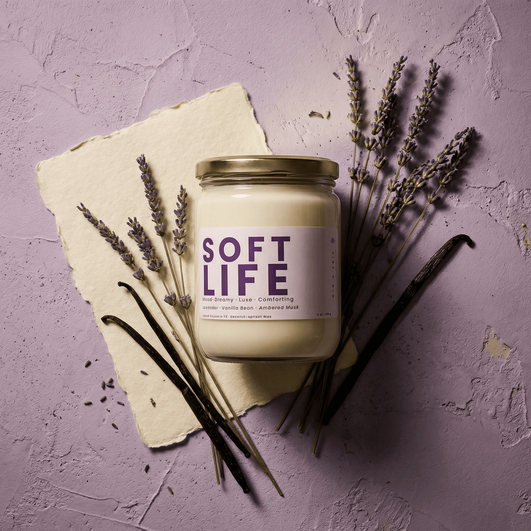 Soft Life 2-wick candle styled with dried lavender and vanilla beans, calming lavender vanilla candle scent