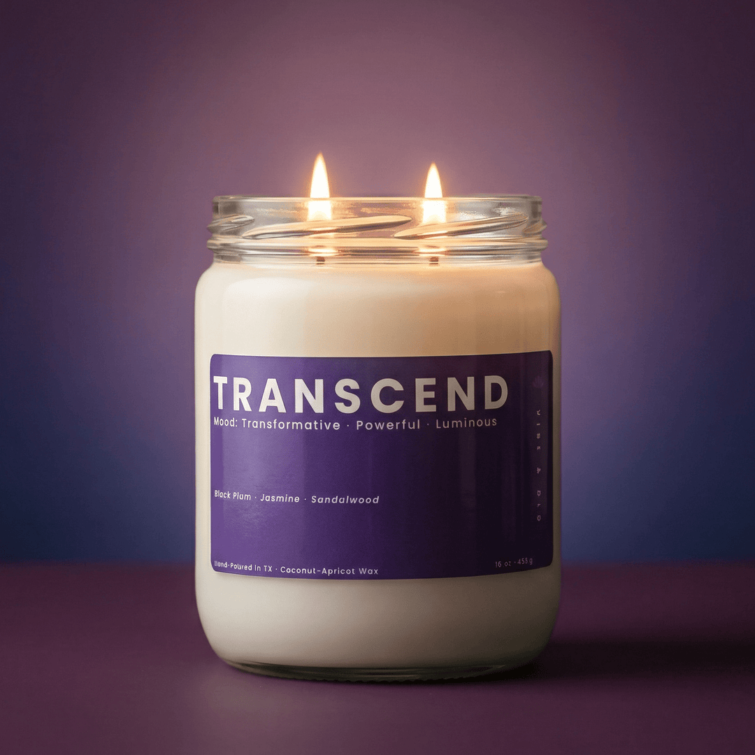 Transcend 2-wick candle with two cotton wicks on a purple gradient background, clean modern product hero image