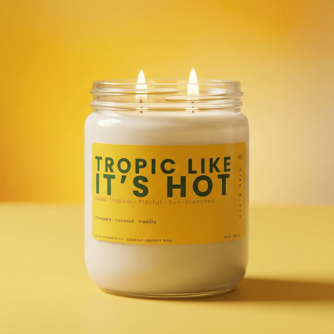 Tropic Like It’s Hot 2 wick candle on yellow background with clean modern aesthetic showing double wick tropical summer candle