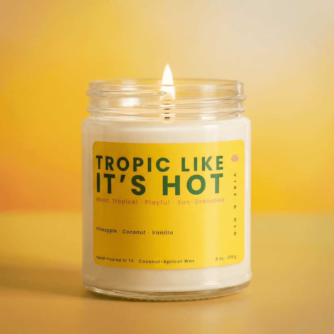 Tropic Like It’s Hot tropical fruit jar candle with pineapple coconut scent on a bright yellow background