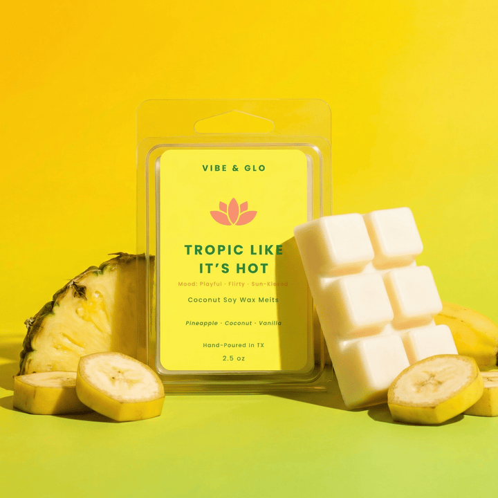 Tropic Like It’s Hot wax melts stacked with pineapple and banana on bright yellow background