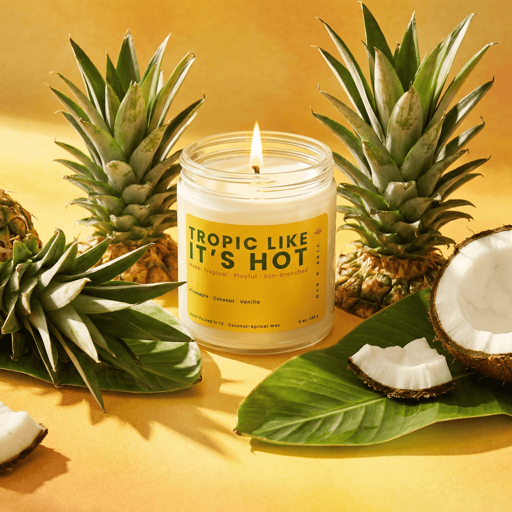 Tropical fruit candle with pineapple and coconut, showcasing a bright summer scent in a glass jar