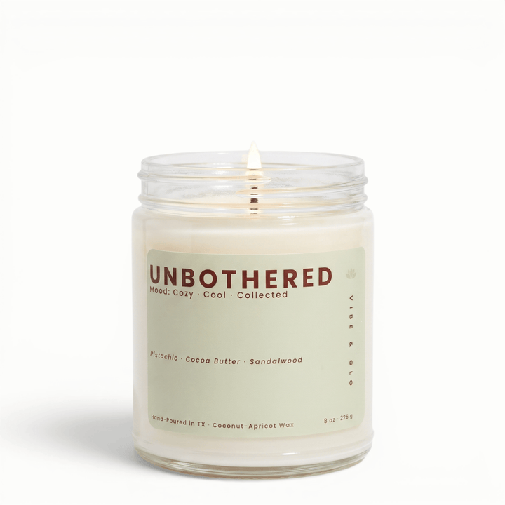 Unbothered pistachio cocoa butter sandalwood candle in glass jar, cozy coconut apricot wax candle for a relaxed and effortless home vibe