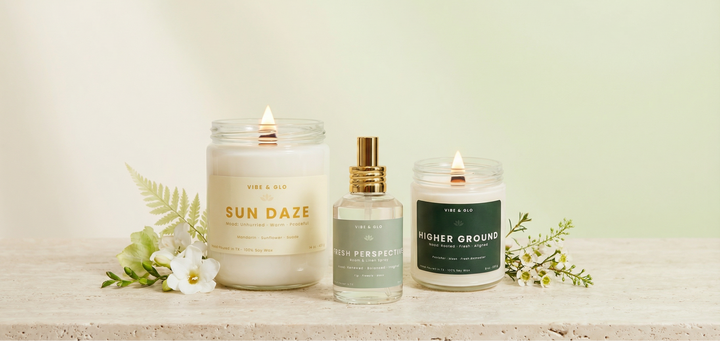 Vibe & Glo wooden wick candles for spring featuring clean-burning soy candles and fresh home fragrance styled with florals.