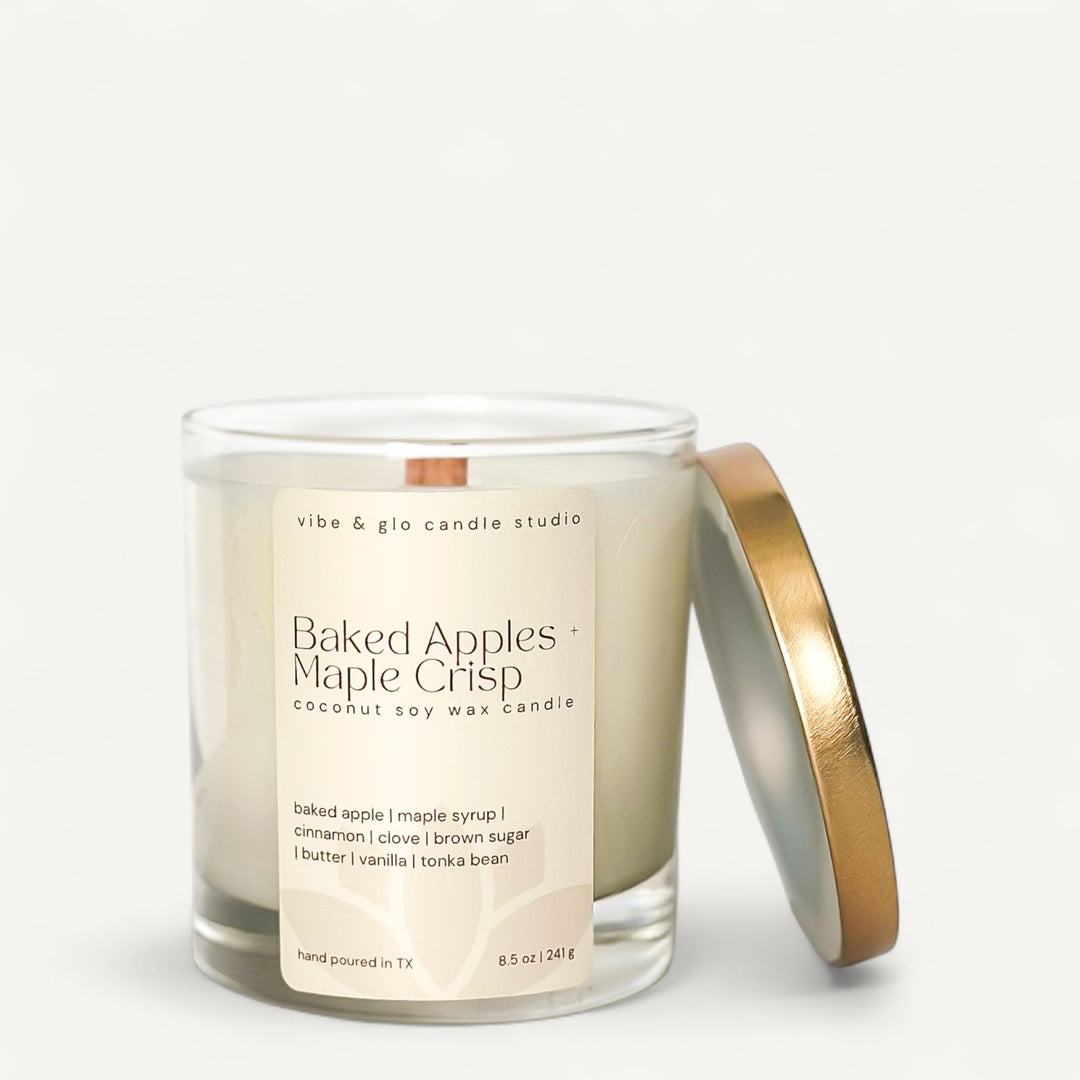 Baked Apples + Maple Crisp candle with a label on a white background