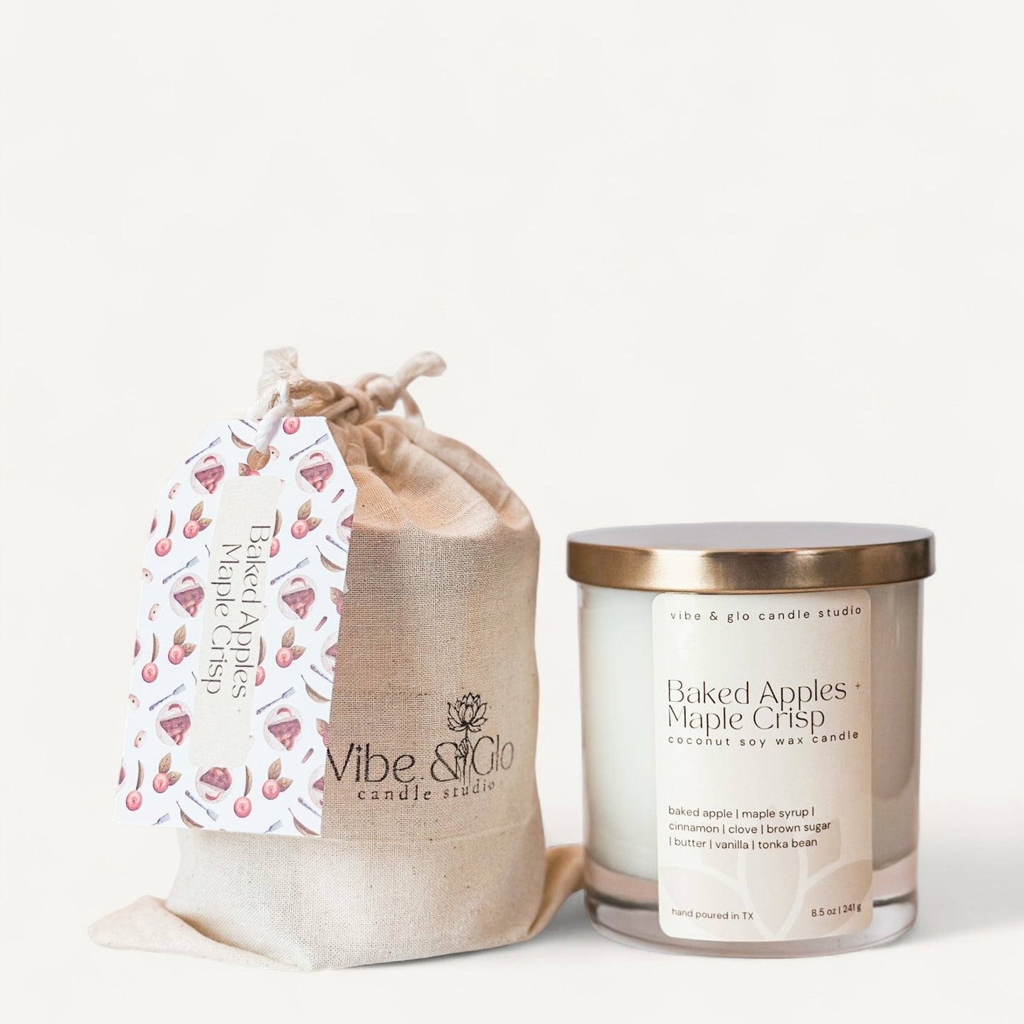 Baked Apples + Maple Crisp candle in a pouch, featuring coconut soy wax and a wooden wick, evoking sweet autumn scents.