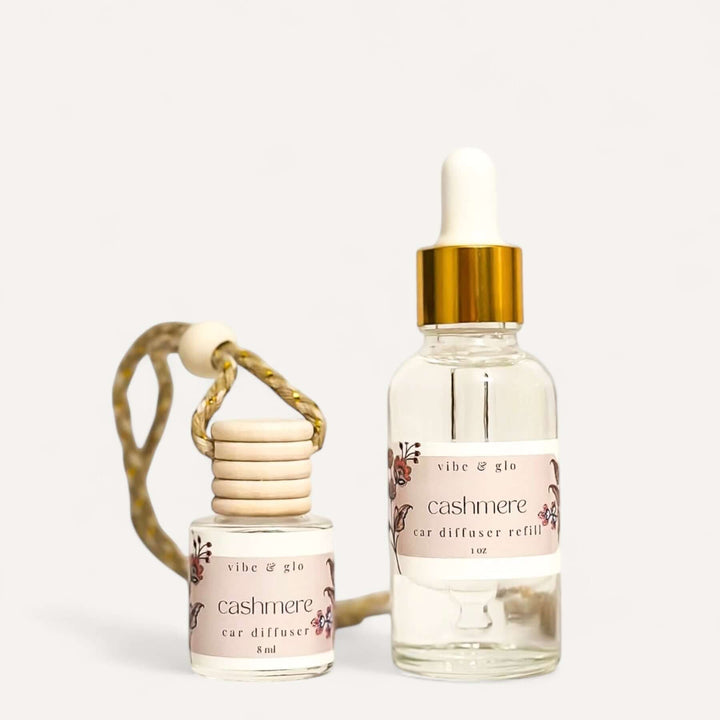 Car diffuser set featuring cashmere scent with an 8ml diffuser and 1oz refill bottle for cars.