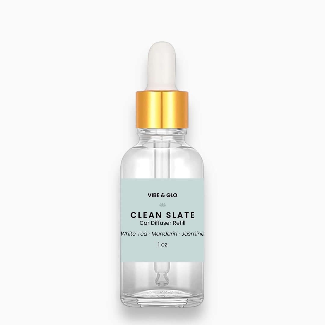 Clear bottle with gold cap labeled 'Vibe & Glo Clean Slate' on a white background
