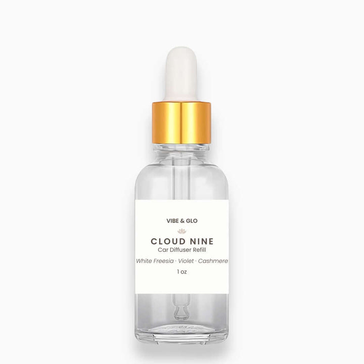 Vibe & Glo Cloud Nine car diffuser refill bottle on a white background