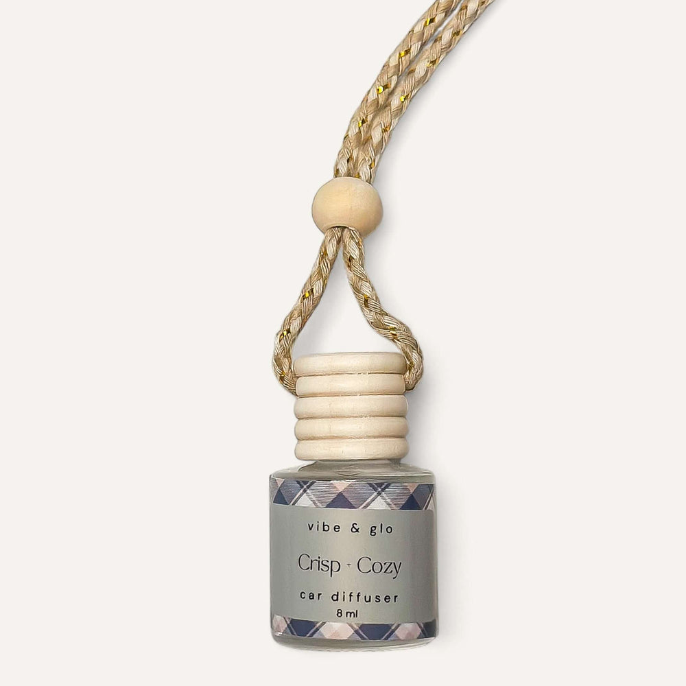 Crisp Cozy fall car diffuser by vibe & glo, featuring a wooden top and braided cord, perfect for autumn scents.