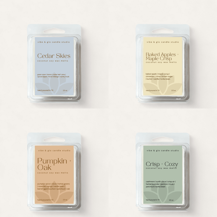 Fall Wax Melt Bundle showcasing Cedar Skies, Baked Apples + Maple Crisp, Pumpkin Oak, and Crisp + Cozy scents in hand-poured packaging.