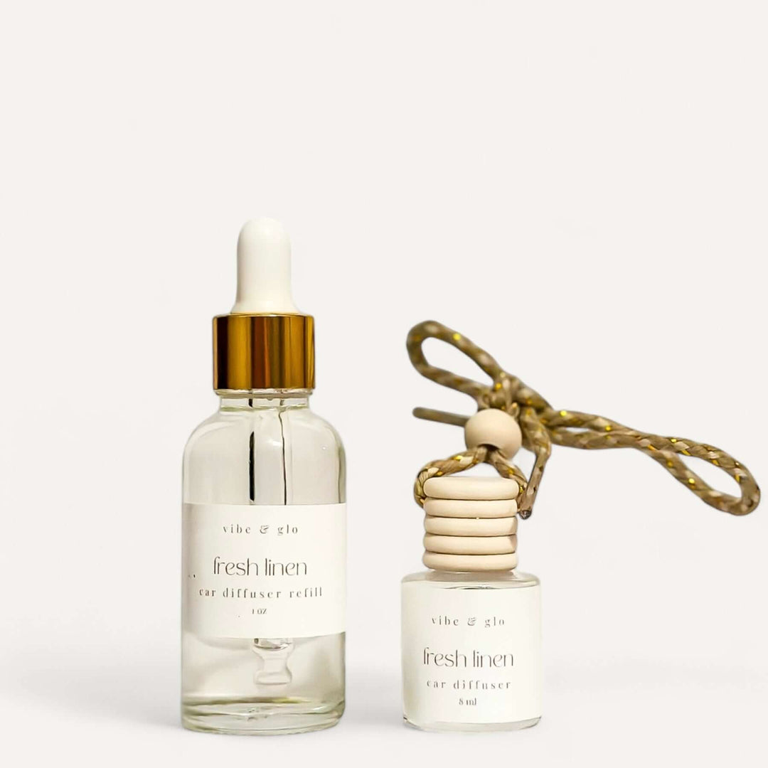Car diffuser and fresh linen refill set, including a dropper bottle and elegant hanging diffuser.