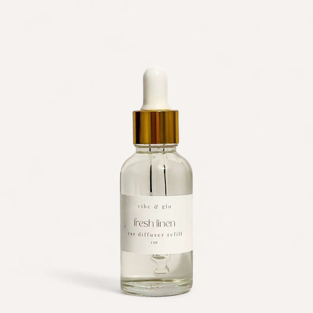 1 oz Car Diffuser Refill in Fresh Linen scent from Vibe & Glo, perfect for hanging car diffusers.