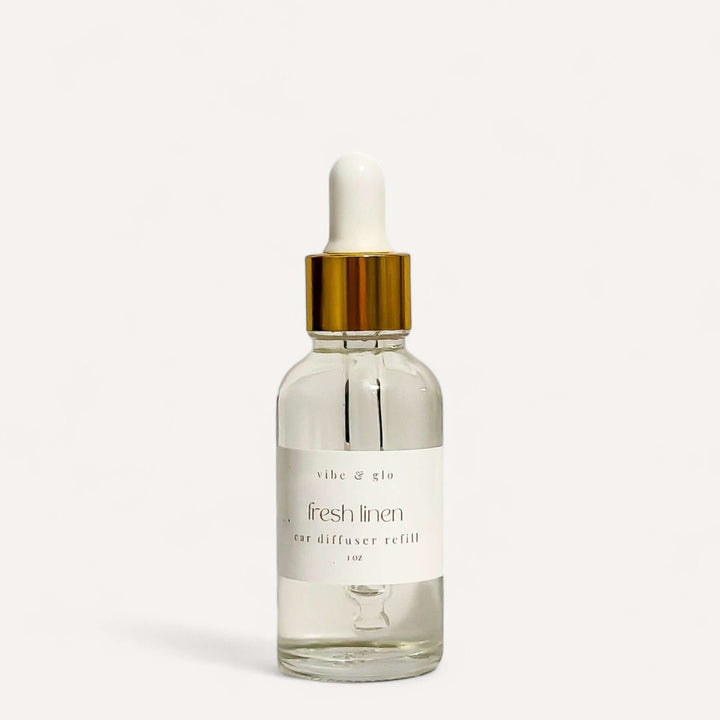 1 oz Car Diffuser Refill in Fresh Linen scent from Vibe & Glo, perfect for hanging car diffusers.