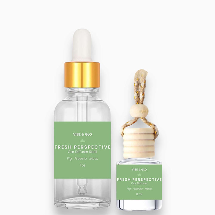 Vibe & Glo Fresh Perspective car diffuser refill bottles on a white background
