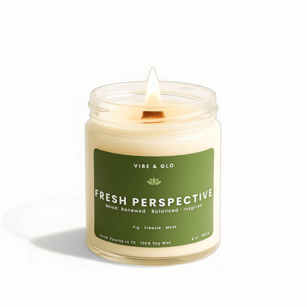 Vibe & Glo candle labeled 'Fresh Perspective' on a white background