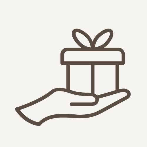 Line drawing of a hand holding a gift box with a bow on a white background