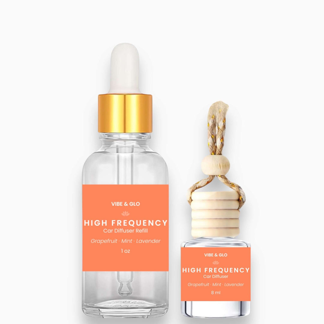Vibe & Glo High Frequency car diffuser refill bottles on a white background