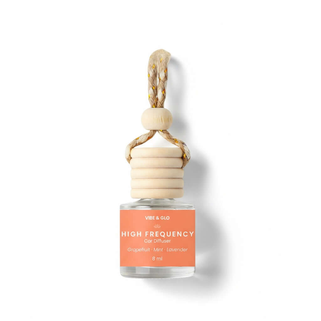 Car freshener with wooden holder and coral label on a white background