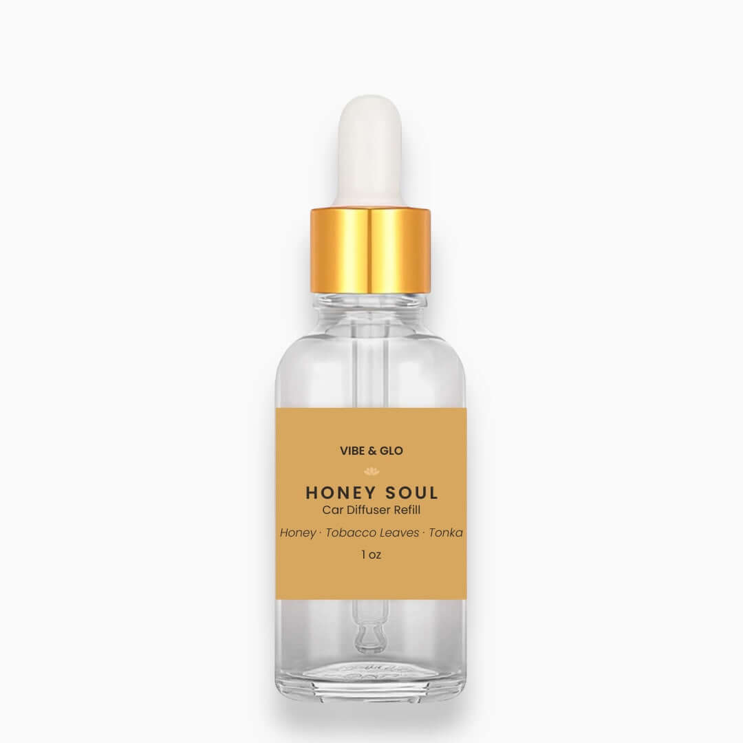 Clear bottle with gold cap labeled 'Honey Soul' on a white background