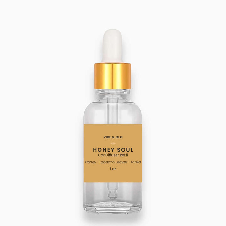 Clear bottle with gold cap labeled 'Honey Soul' on a white background