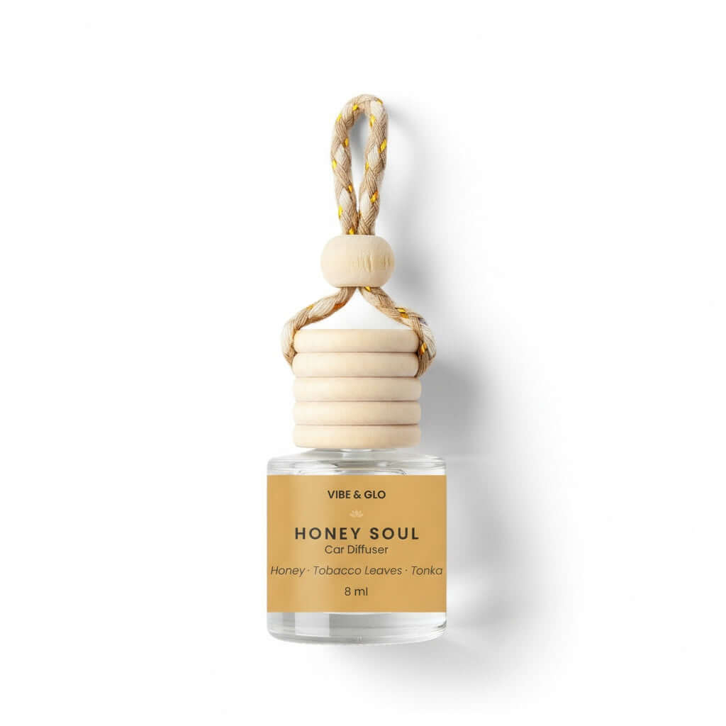 Vibe & Glo Honey Soul car diffuser with wooden holder on a white background