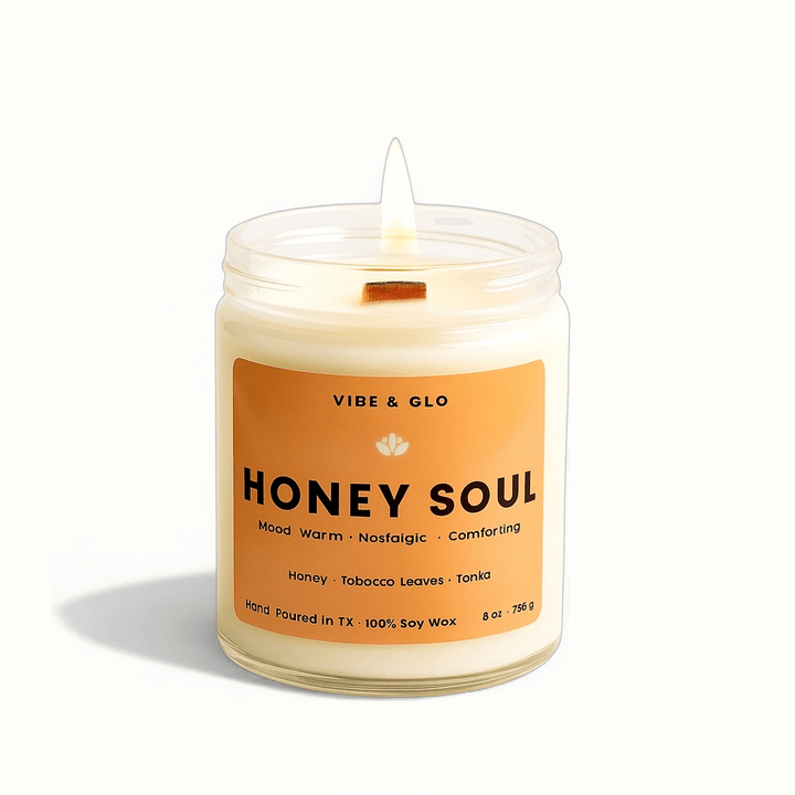 Candle in a jar labeled 'Honey Soul' by Vibe & Glo on a white background