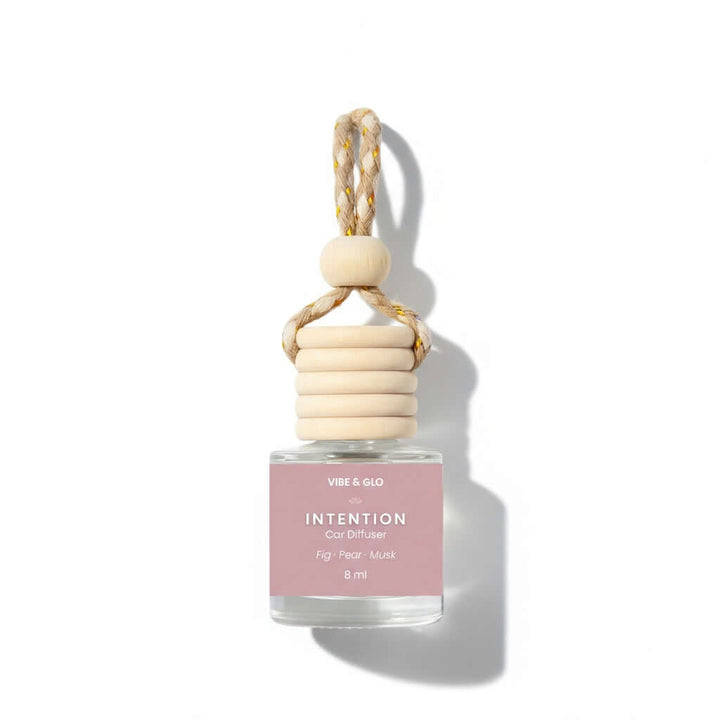 Vibe & Co. car diffuser with pink label on a white background