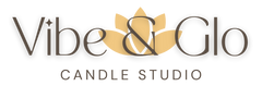 Logo of Vibe & Glo Candle Studio with a gold flower design on a white background