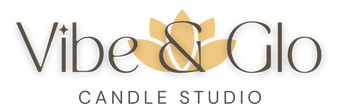 Logo of Vibe & Glo Candle Studio with a gold flower design on a white background
