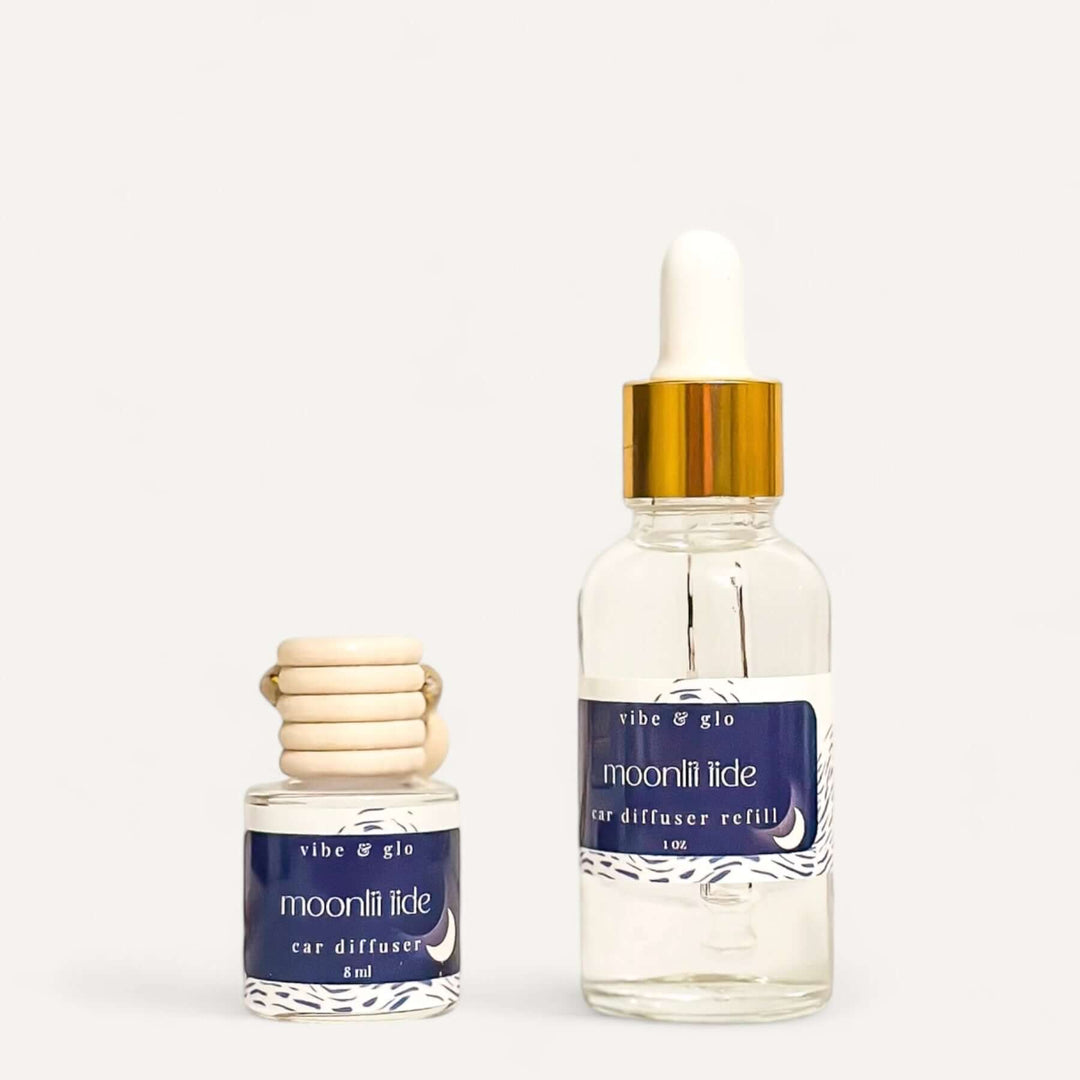 Car diffuser and refill set including 1 oz dropper bottle and elegant hanging diffuser for a fresh scent.